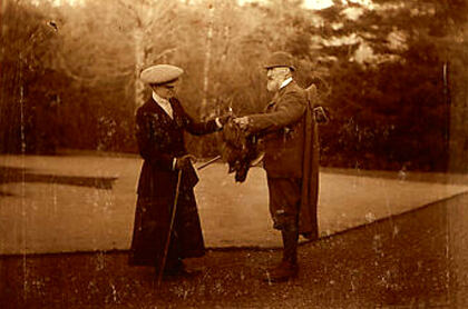 A couple with game from a day's shooting at Spean Lodge, c.1890s